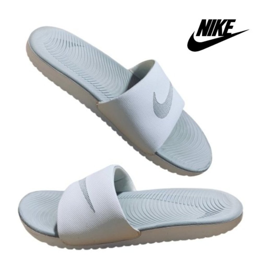 NIKE | SZ 10 WOMENS GREY STITCHED SLIP ONS